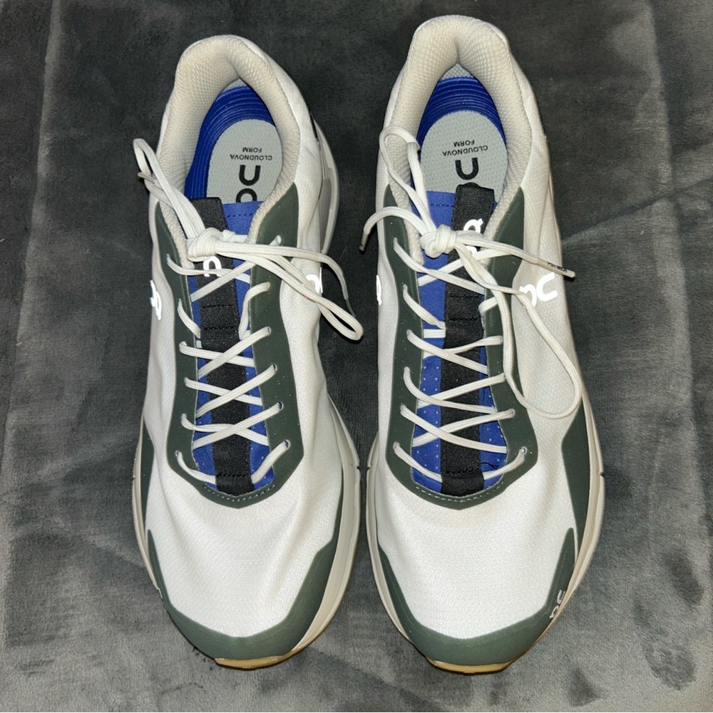 On Running White and Blue Athletic Shoes with Chunky Design